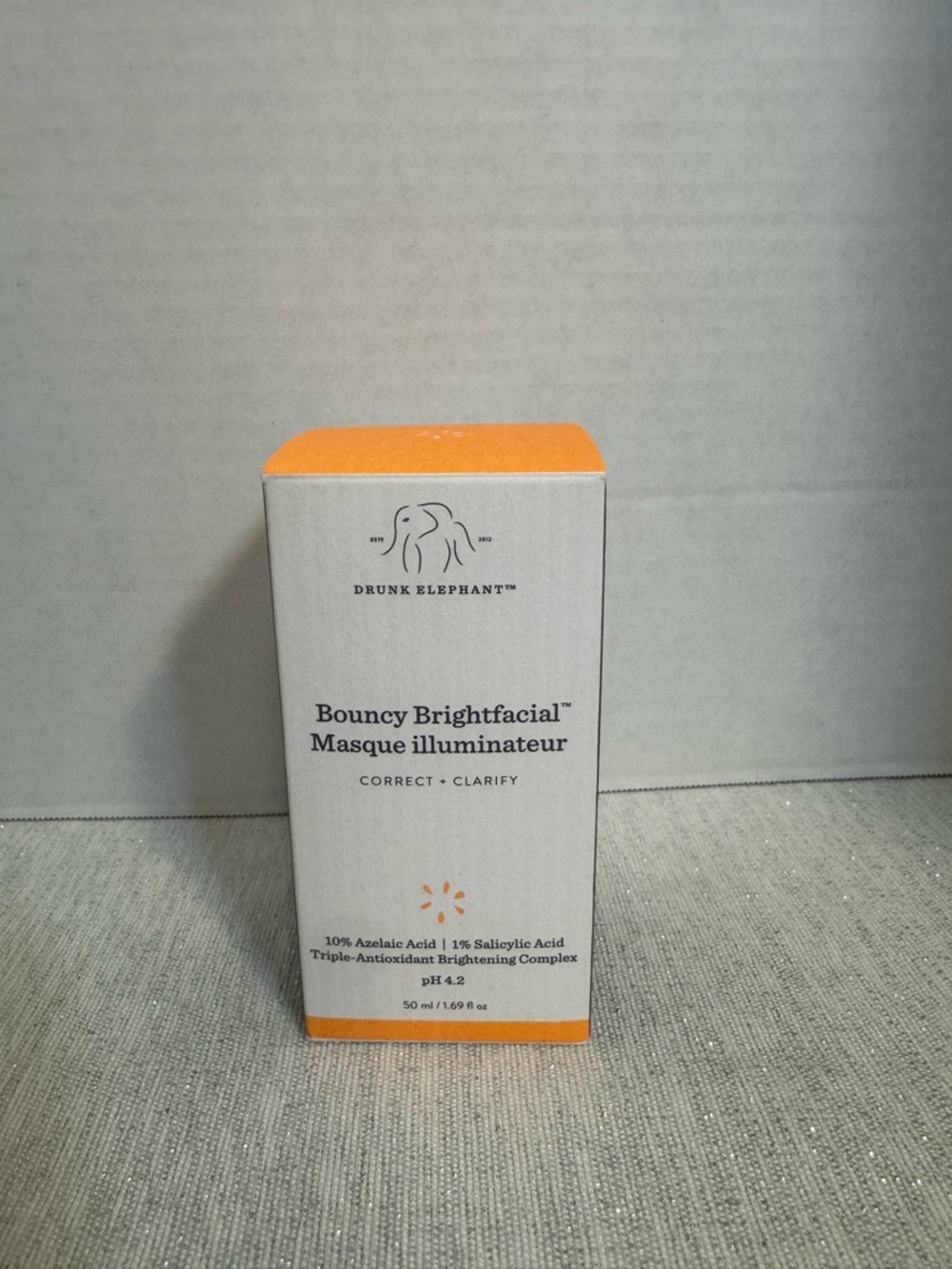 Drunk Elephant Bouncy Brightfacial Masque — White with Orange Accent